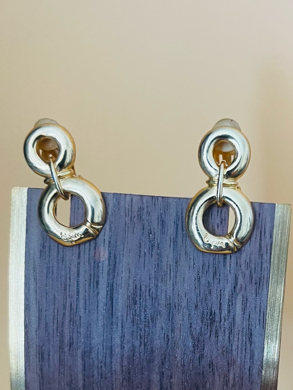 Vintage Bijan perfume bottle shape logo clip earrings